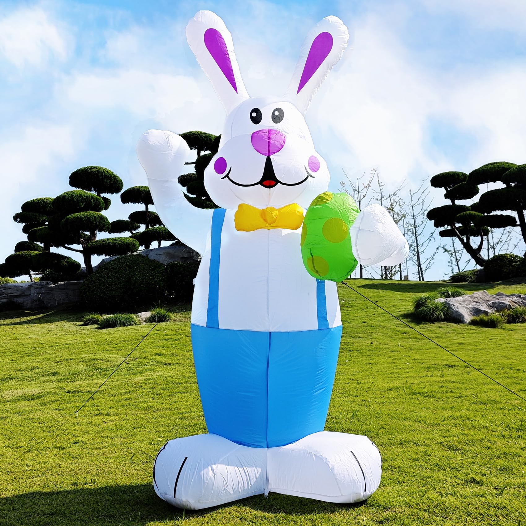 DearSun Easter inflatable bunny holding an egg with LED lights brightens your yard at night.