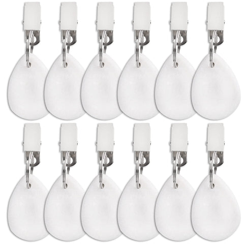 DEAYOU teardrop marble weight with clip securing a white tablecloth outdoors