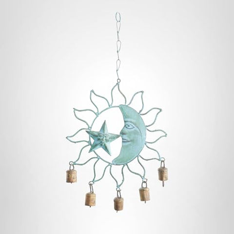 Deco 79 handcrafted in India adds artisanal charm.