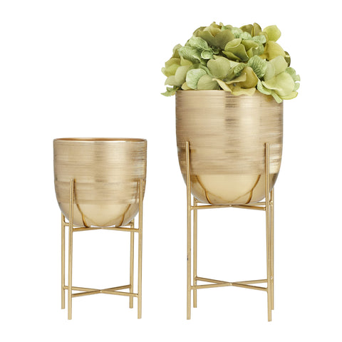 No drainage holes in Deco 79 planters, decorative display only.