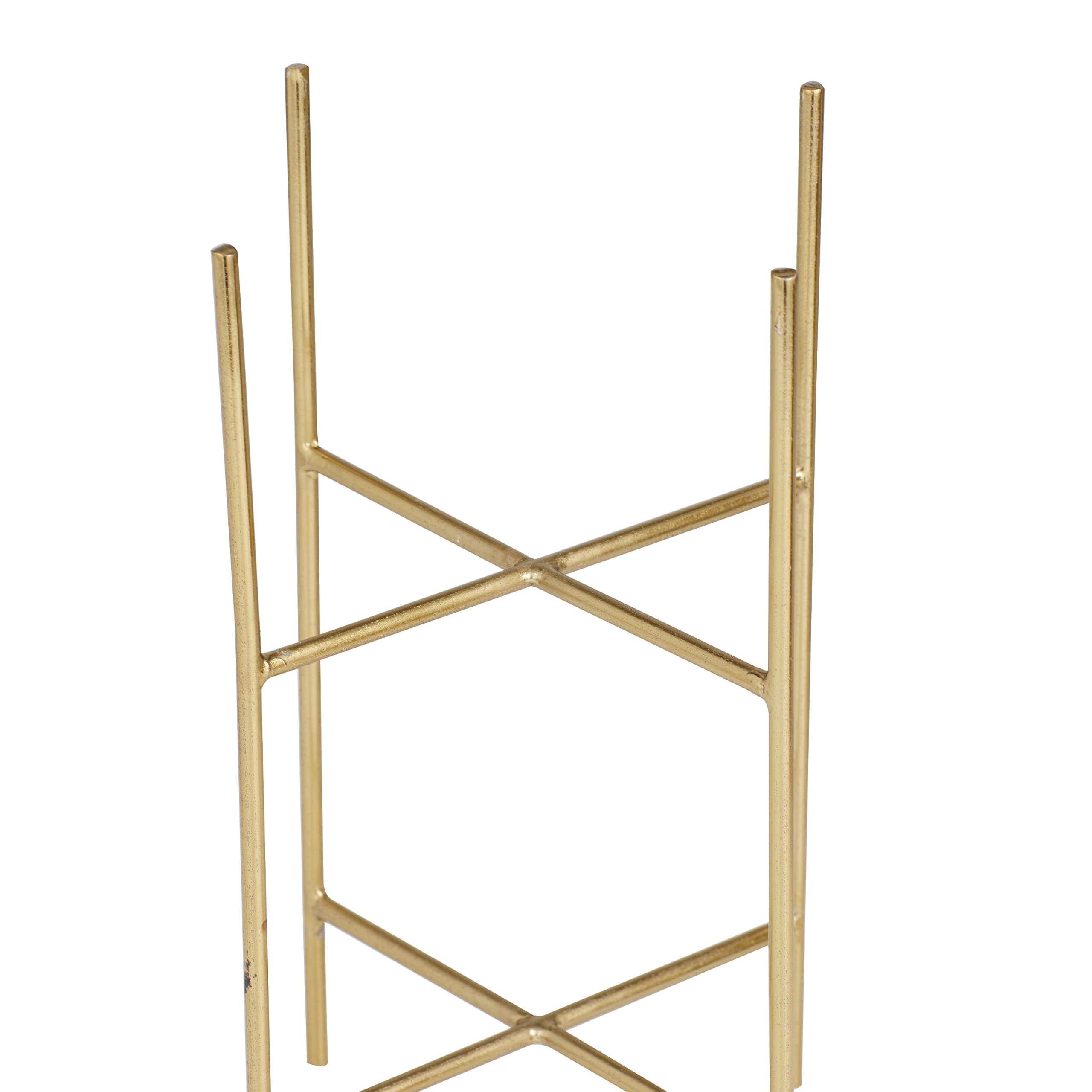 Pair of Deco 79 planters arranged on a table for a refined vignette.