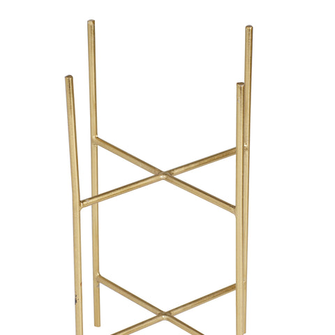 Pair of Deco 79 planters arranged on a table for a refined vignette.