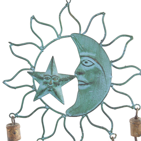 Deco 79 sun ray cutouts create intricate light patterns.