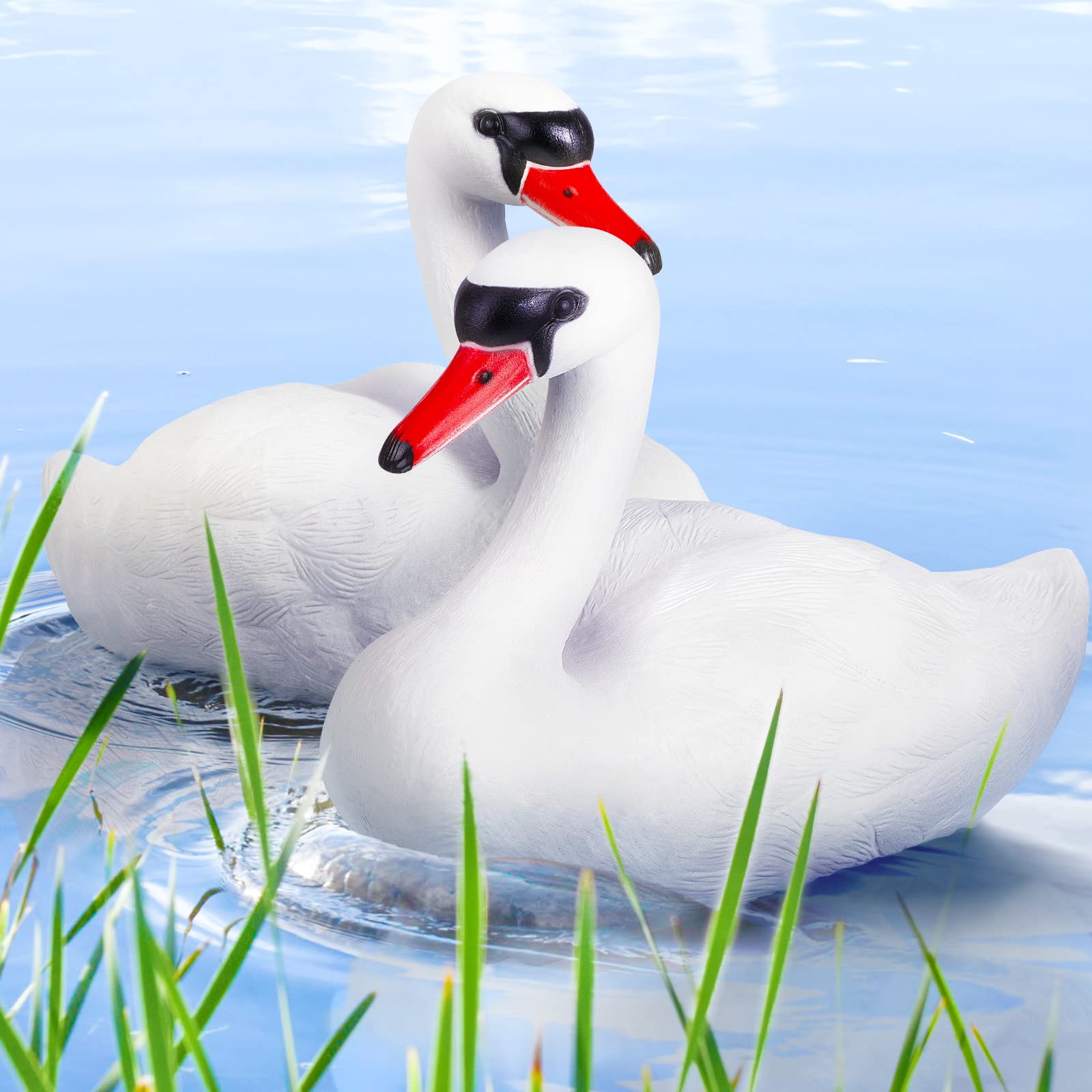 Deekin floating swan decoy two-pack enhances pond aesthetics and wildlife deterrence.