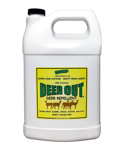 Deer Out 1gal refill bottle pouring for easy application to deter wildlife.