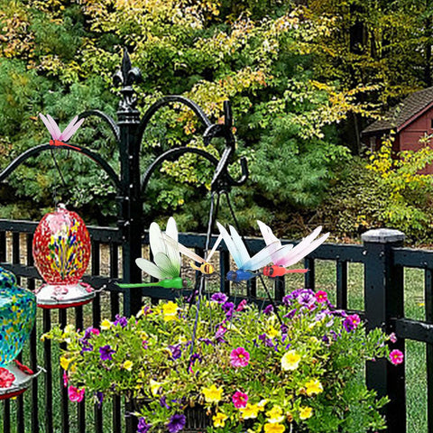 Deiksuir metal dragonfly outdoor decor adds grace and practicality.