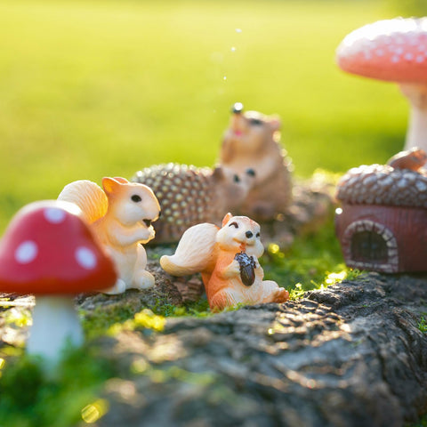 Delighture Fairy Garden squirrel figurine 2 enhances color and storytelling in DIY setups.