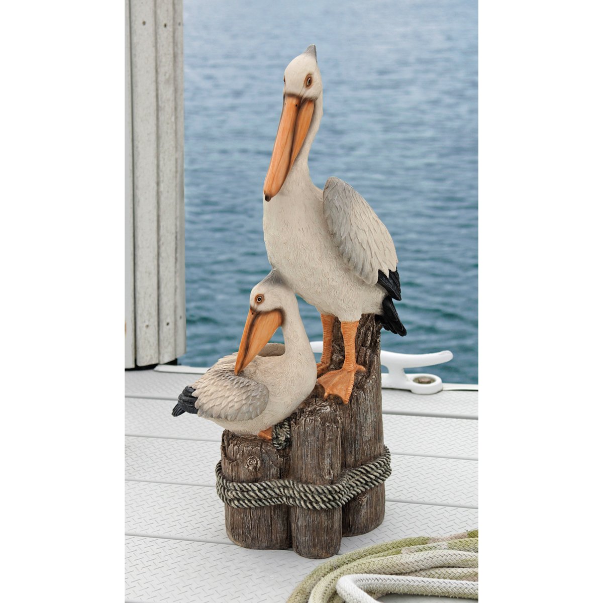 Design Toscano patio lawn sculpture pelicans enhances outdoor entertaining areas.