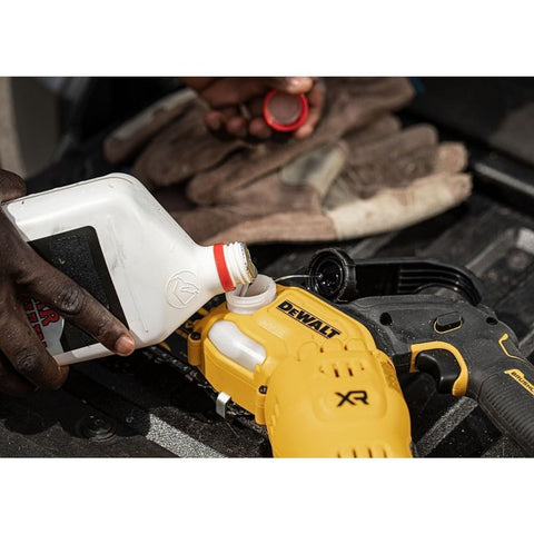 DEWALT chainsaw pruning 20V 8in cutting action in use