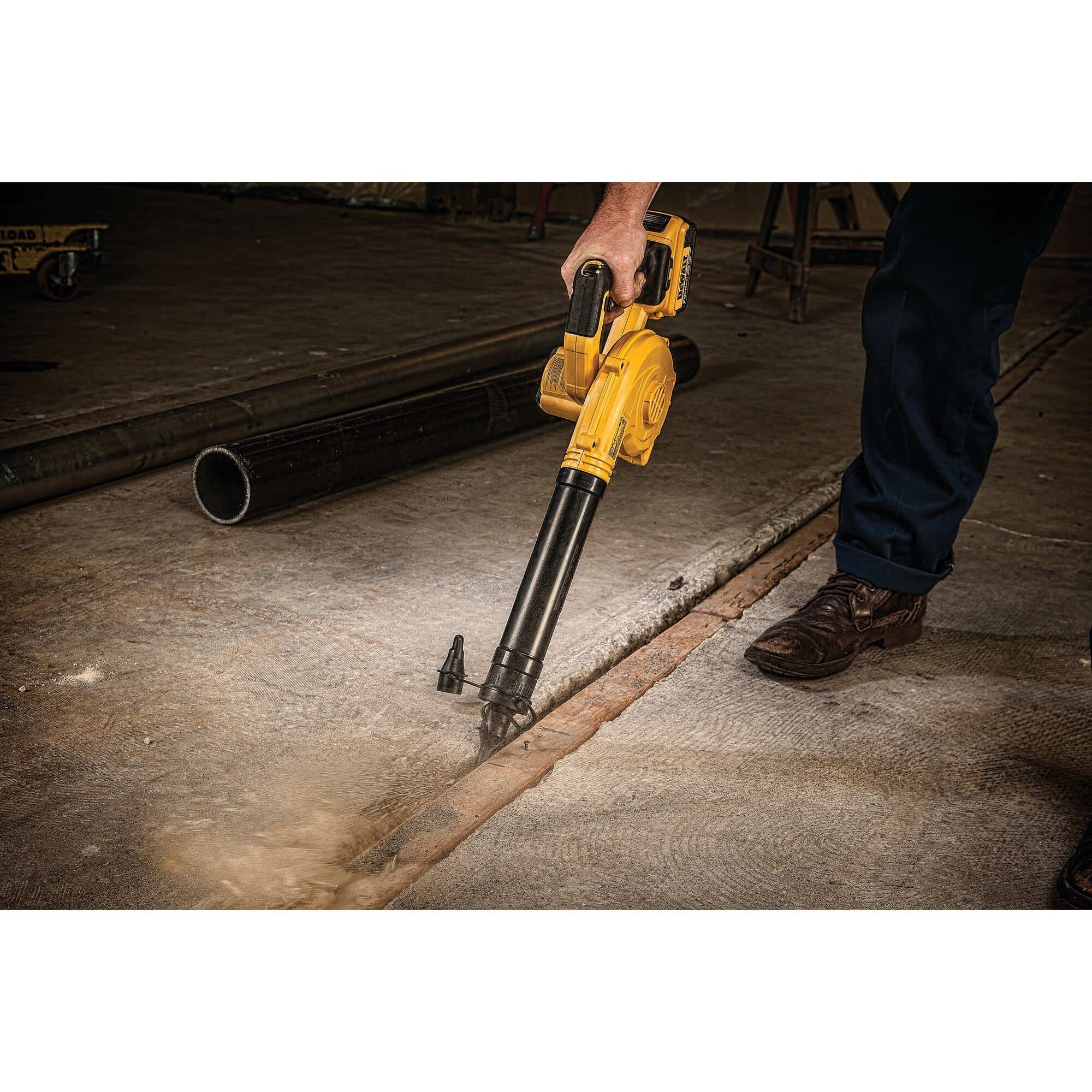 DEWALT compact blower with three attachments for versatile cleaning tasks.