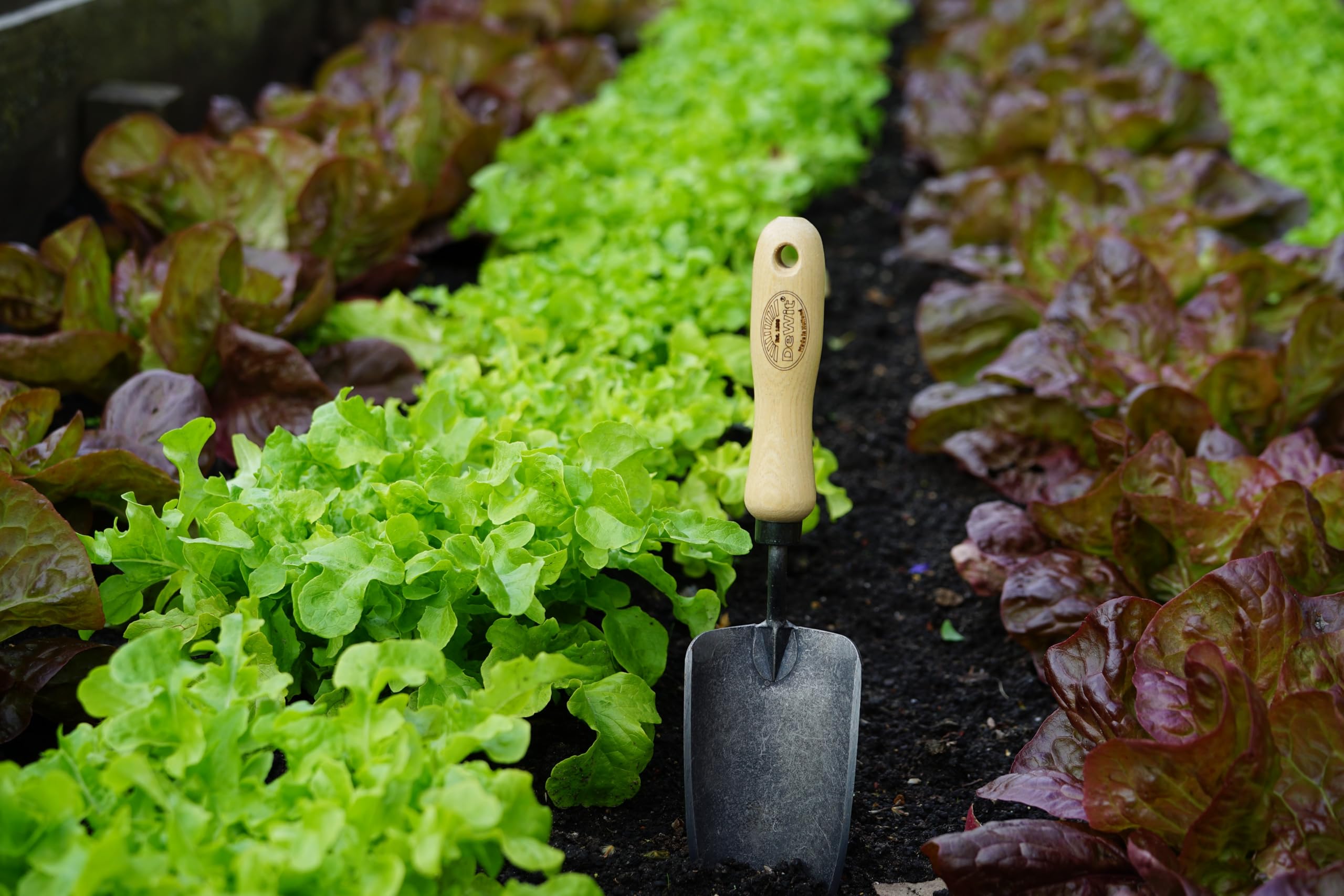 DeWit lifetime durability badge indicates enduring quality for garden tasks.