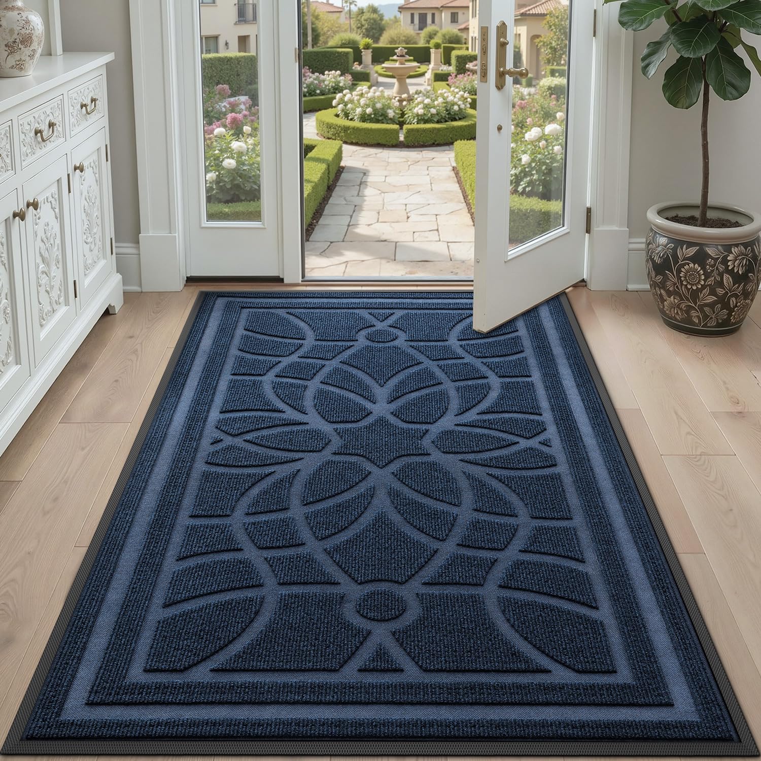 DEXI front-door mat in use welcomes guests while trapping debris