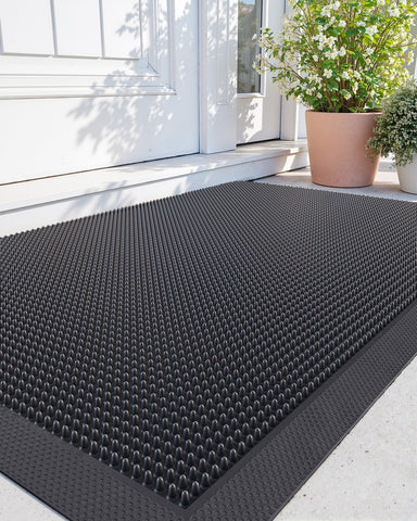 DEXI front door mat with fingertip pattern traps dirt at the entryway.