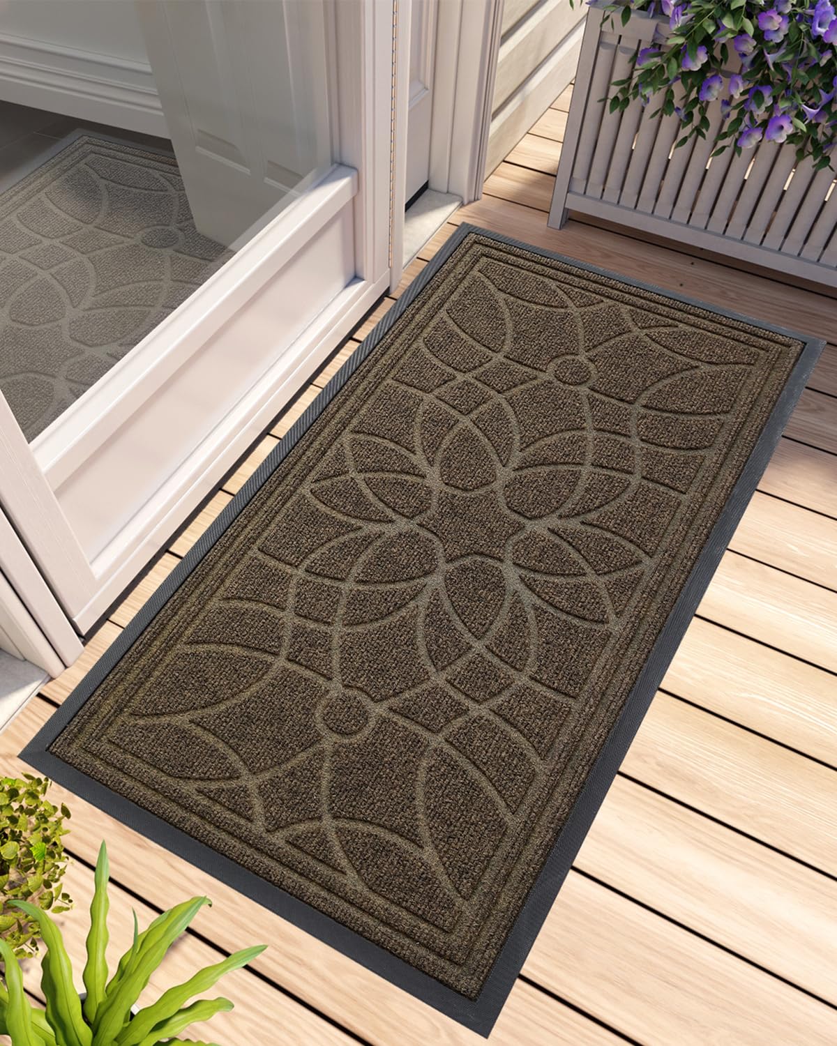 DEXI front door mat at outdoor entrance capturing dirt at the threshold