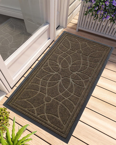 DEXI front door mat at outdoor entrance capturing dirt at the threshold