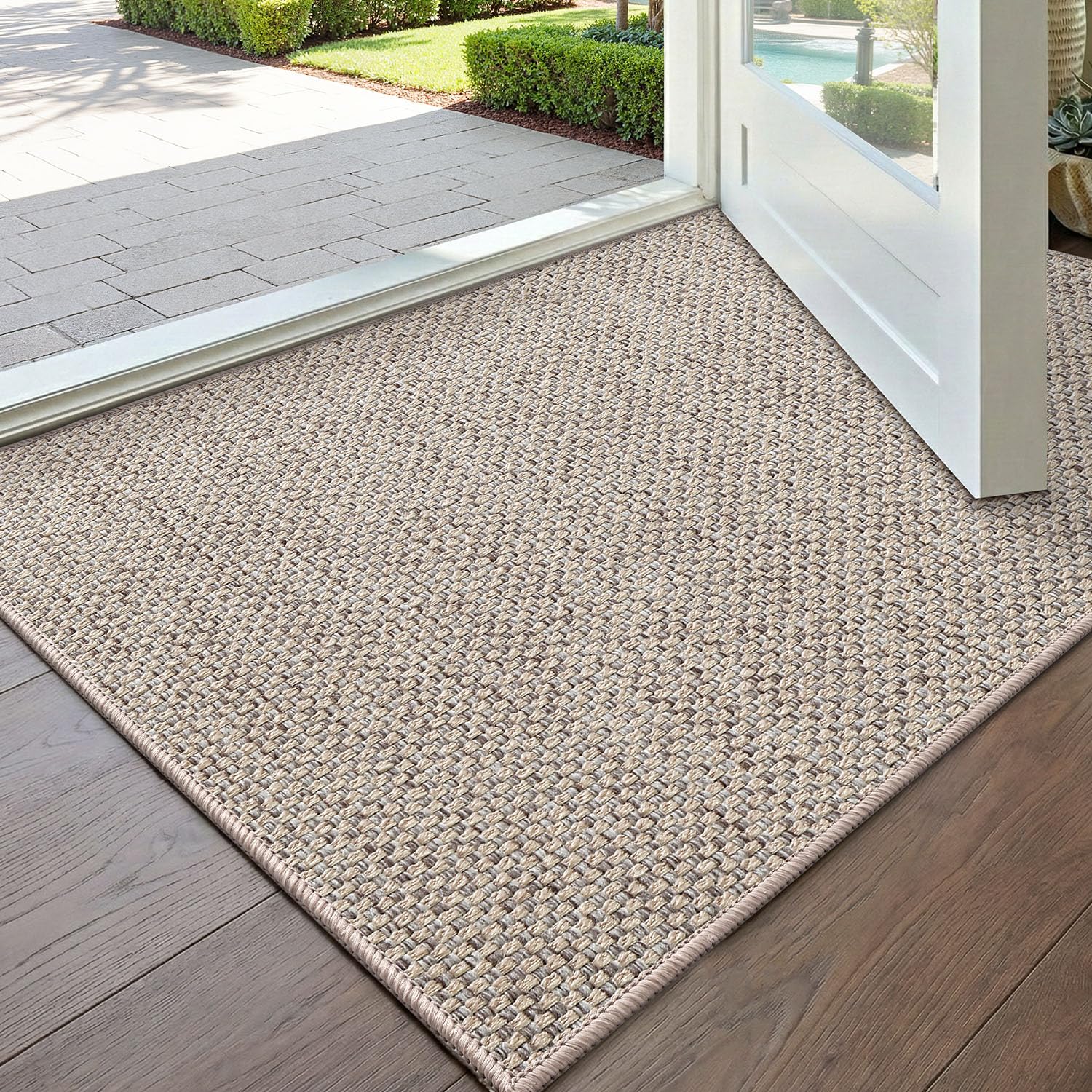 DEXI ultra-thin beige door mat traps dirt at the entry, keeping floors cleaner.