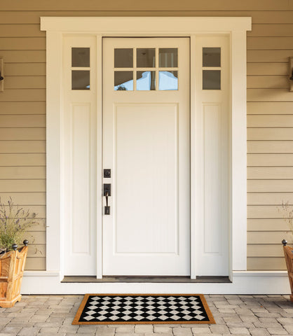 DII entrance mat with non-slip backing stays in place.