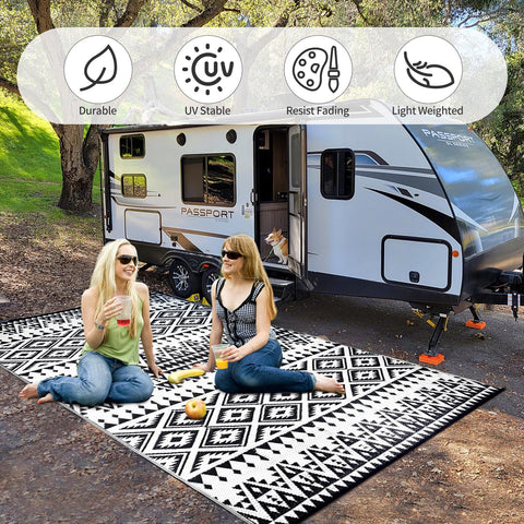 DiiKoo beach picnic scene with waterproof rug on sand