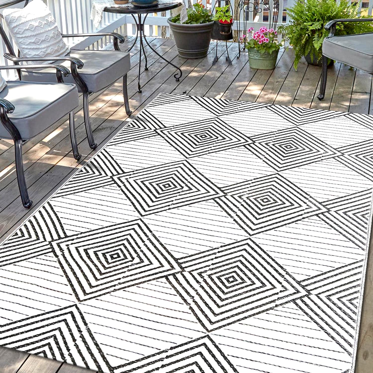 DiiKoo waterproof outdoor rug 5x8ft front view shows dual reversible patterns for versatile spaces