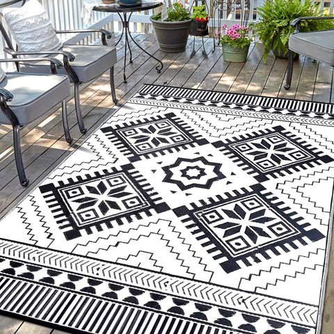 DiiKoo waterproof outdoor rug 6x9ft with two boho patterns for versatile exterior styling.