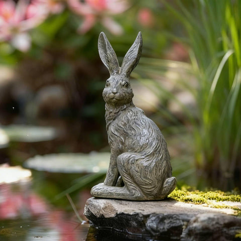 DiliComing gray-concrete look rabbit decor adds neutral style to any outdoor space.