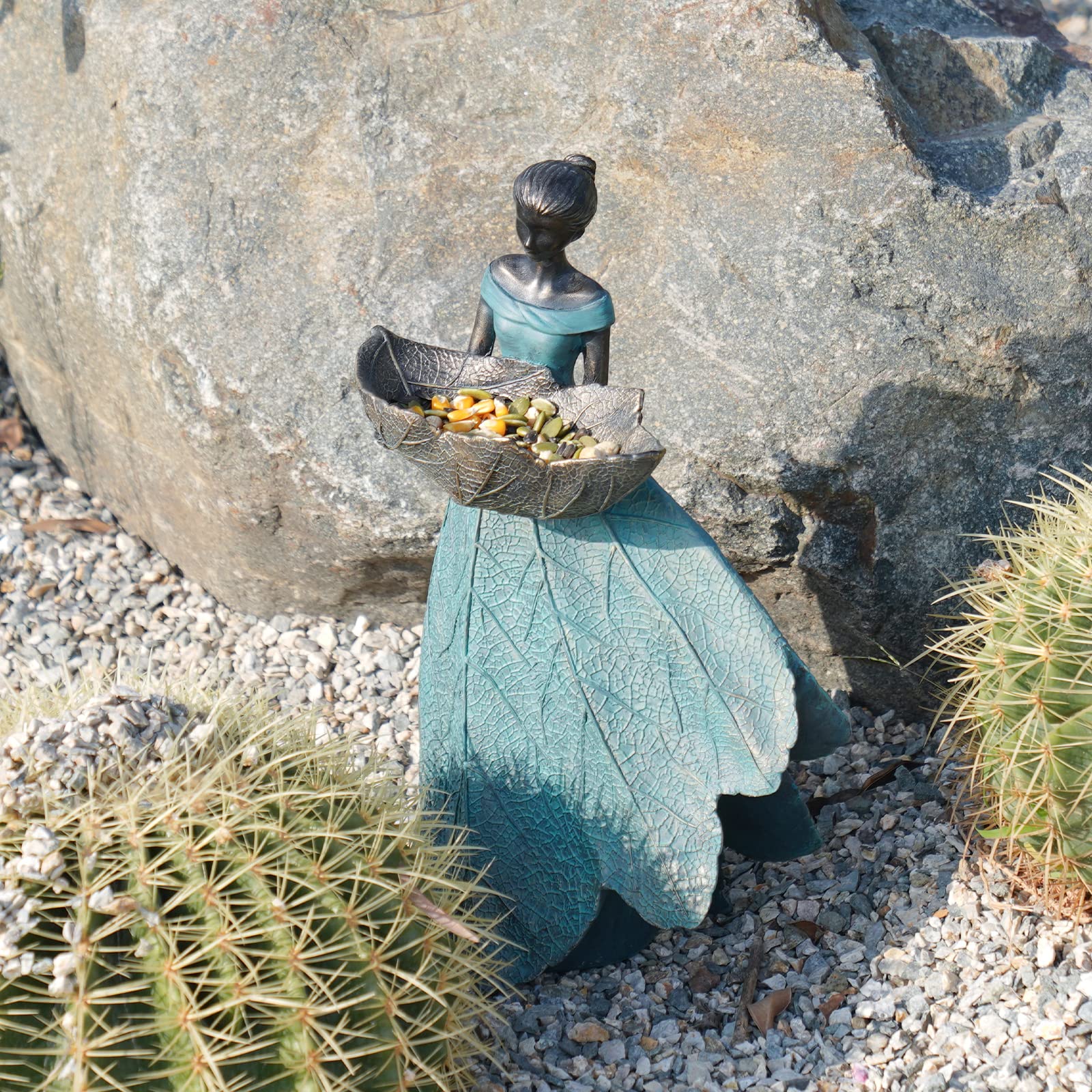 DiliComing weatherproof fairy statue endures seasonal conditions with charm.