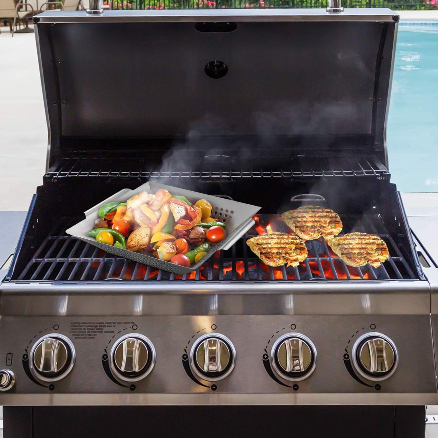 DIMESHY 12-inch grill basket placed over hot coals highlighting durability