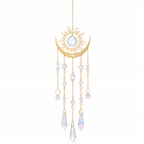 Divina Vitae crystal suncatcher on a window casting vivid rainbow colors for ambience.