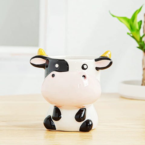 DIYOMR cow planter top view highlights smooth glaze and bright finish for shelf display