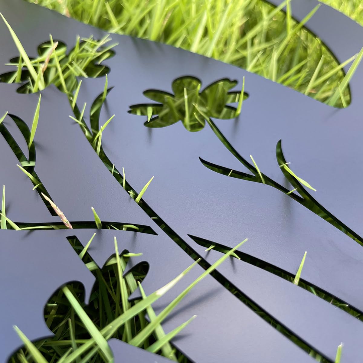 Doesen black dog silhouette outdoor stake adds durable, weather-ready charm.
