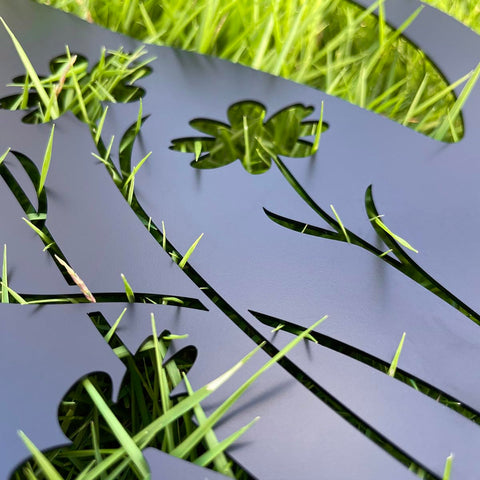 Doesen black dog silhouette outdoor stake adds durable, weather-ready charm.