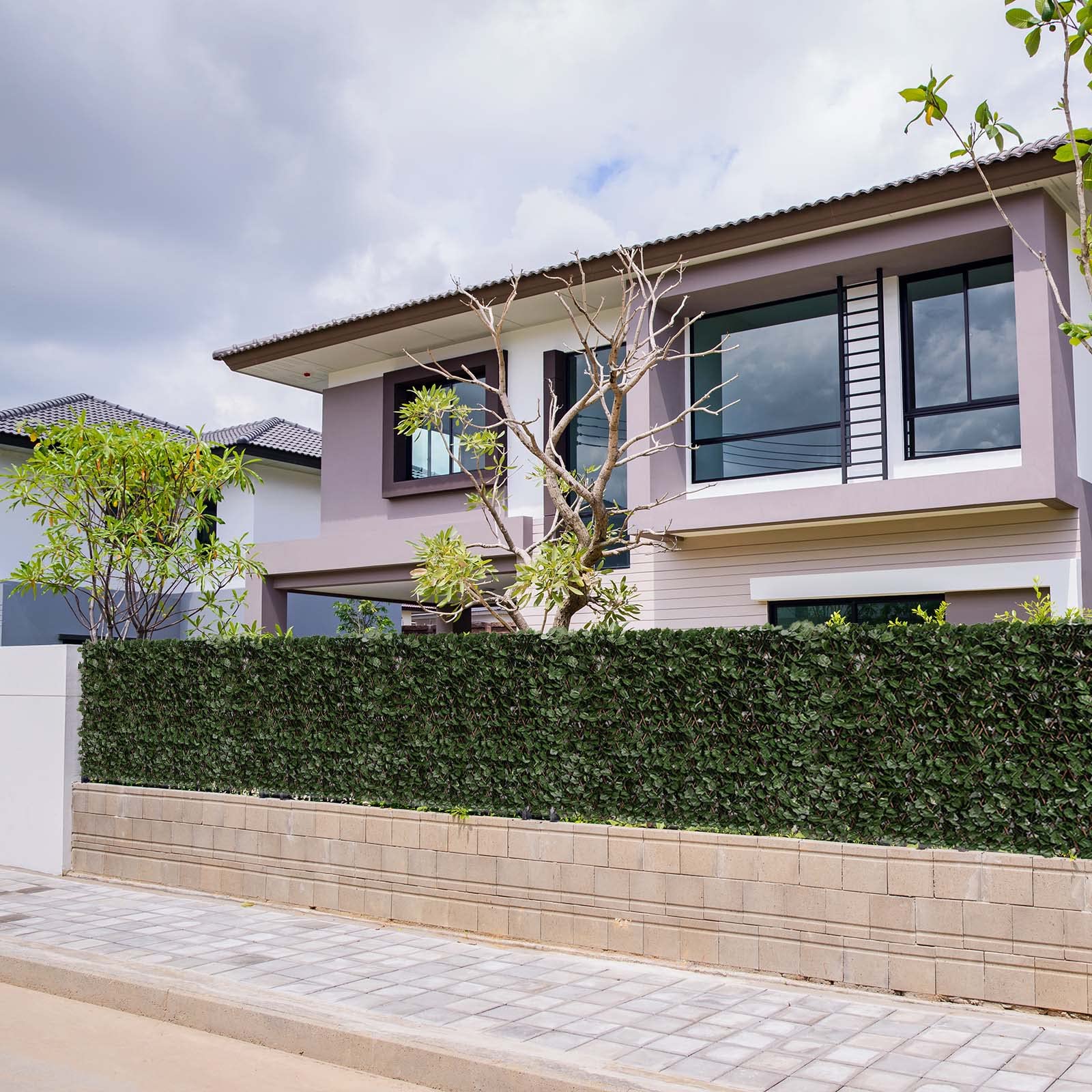 DOEWORKS outdoor backdrop with ivy fence enhances patio ambiance and garden décor.