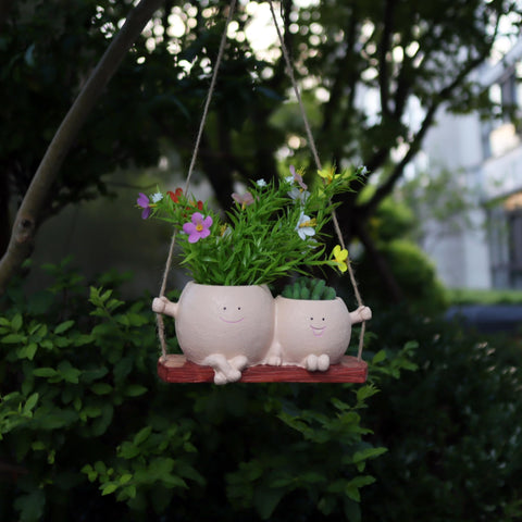 Dolkgy decorative head planter brightens windowsill, desk, or shelf.
