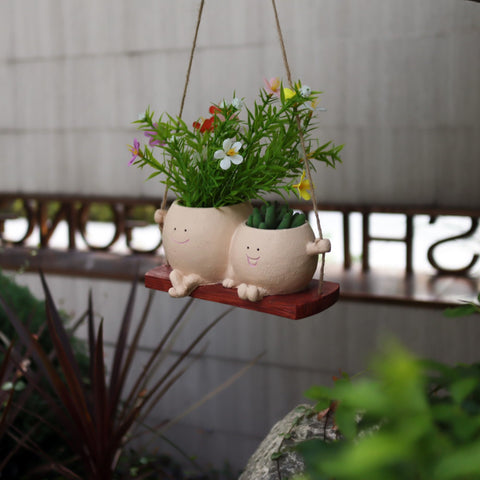 Dolkgy outdoor indoor resin planter withstands varied weather.
