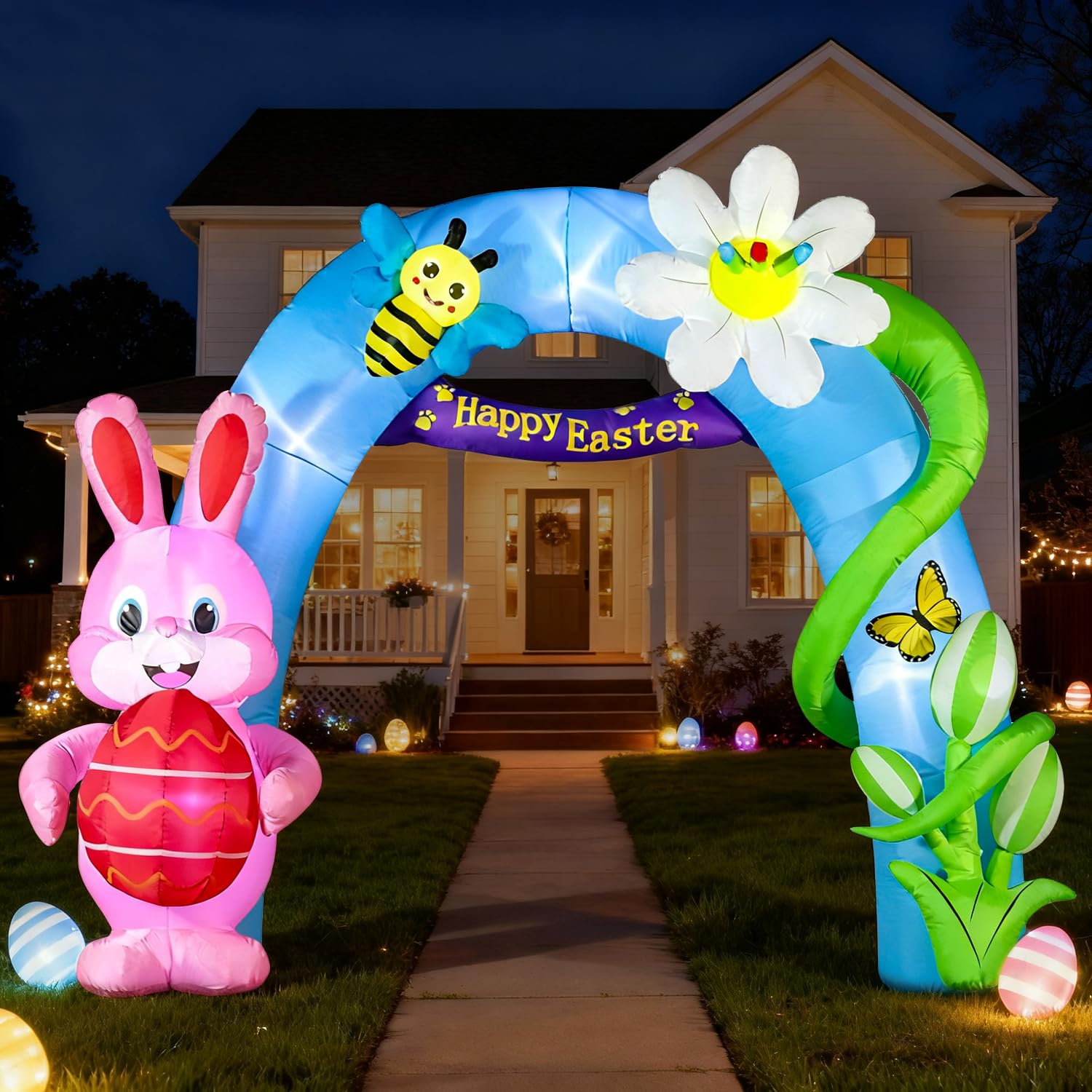 DomKom inflatable bunny archway illuminated at dusk for inviting ambiance