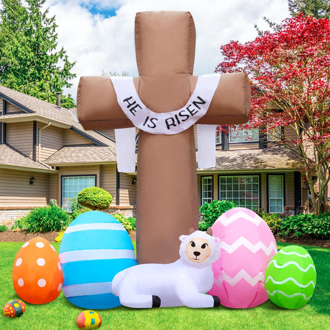 DomKom Easter Cross inflatable in full yard view with built-in LED lights for festive outdoor decor.