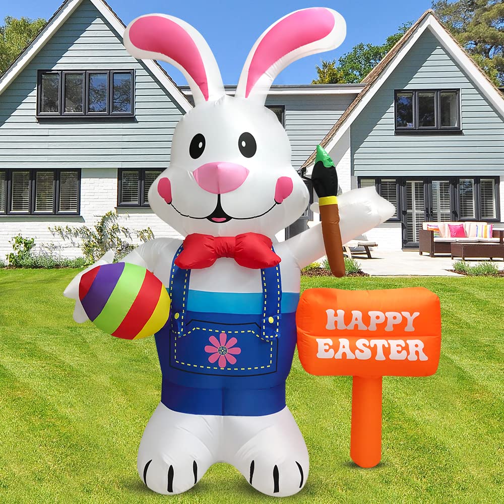 DomKom Easter inflatable bunny with paintbrush adds colorful outdoor charm.