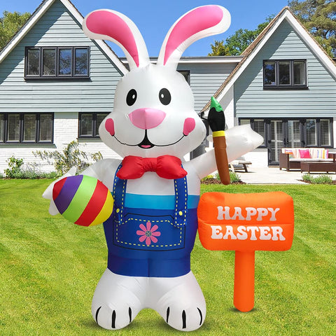 DomKom Easter inflatable bunny with paintbrush adds colorful outdoor charm.