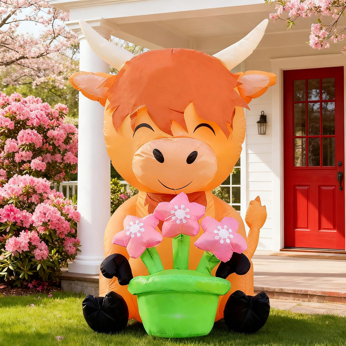 DomKom 5ft Highland Cow inflatable stands tall in the yard, a playful outdoor focal point.