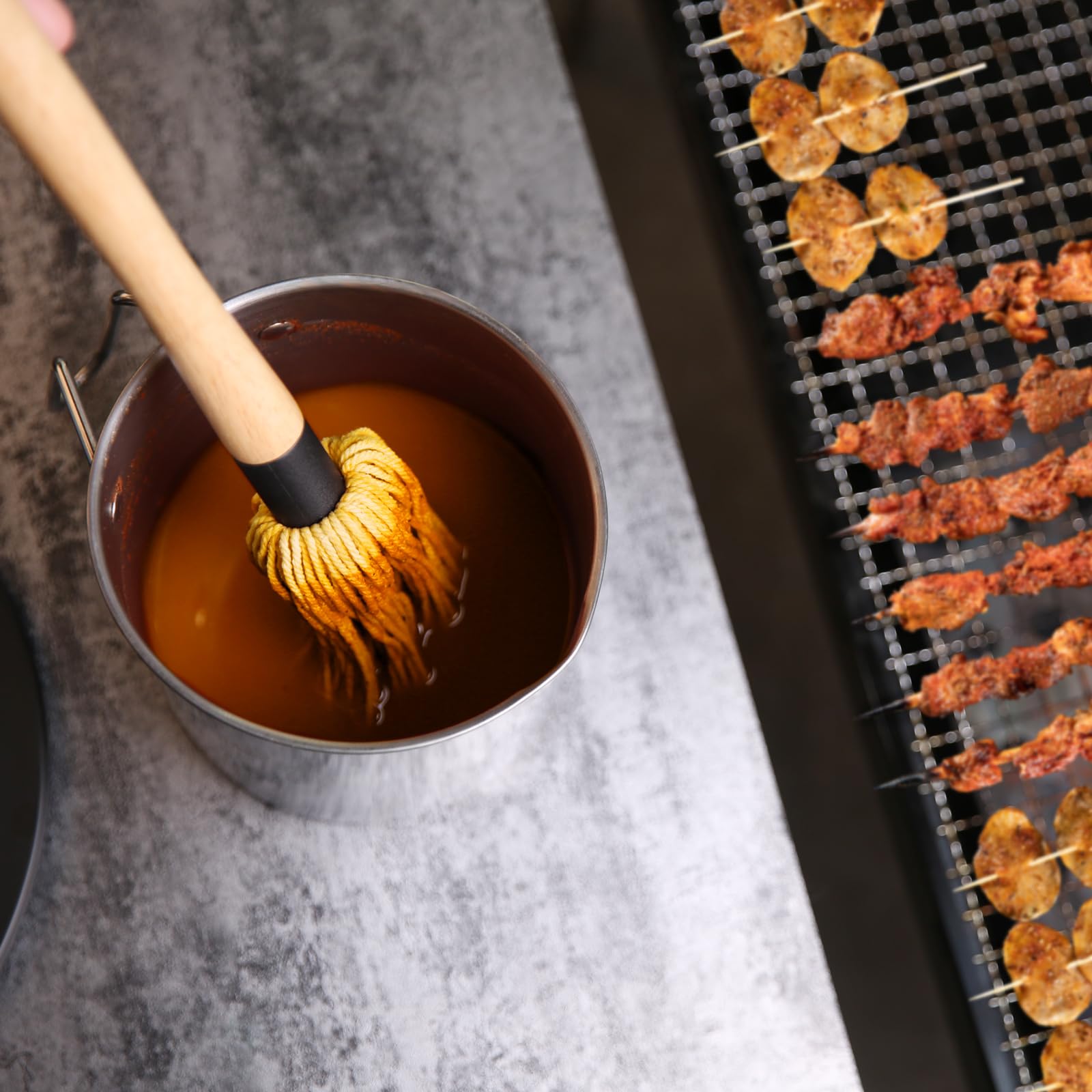 Donxote mop in use, glazing ribs on a smoker