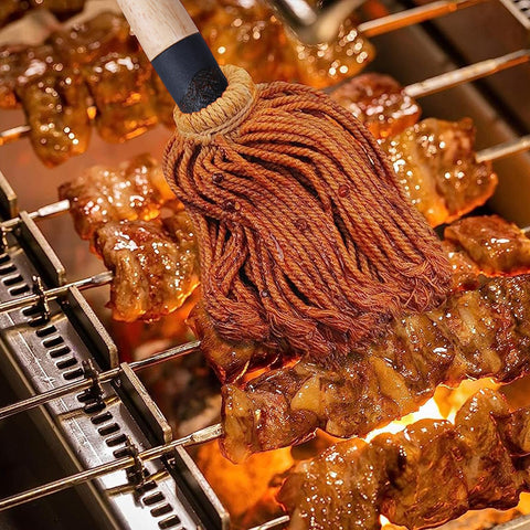 Long wooden handle design in a Donxote BBQ mop for better control