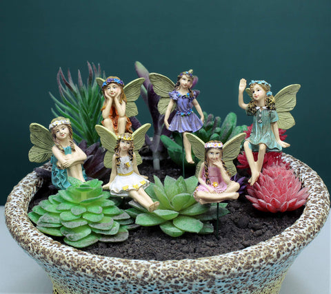 Dorlotou miniature fairies for patios and lawns add whimsical charm.