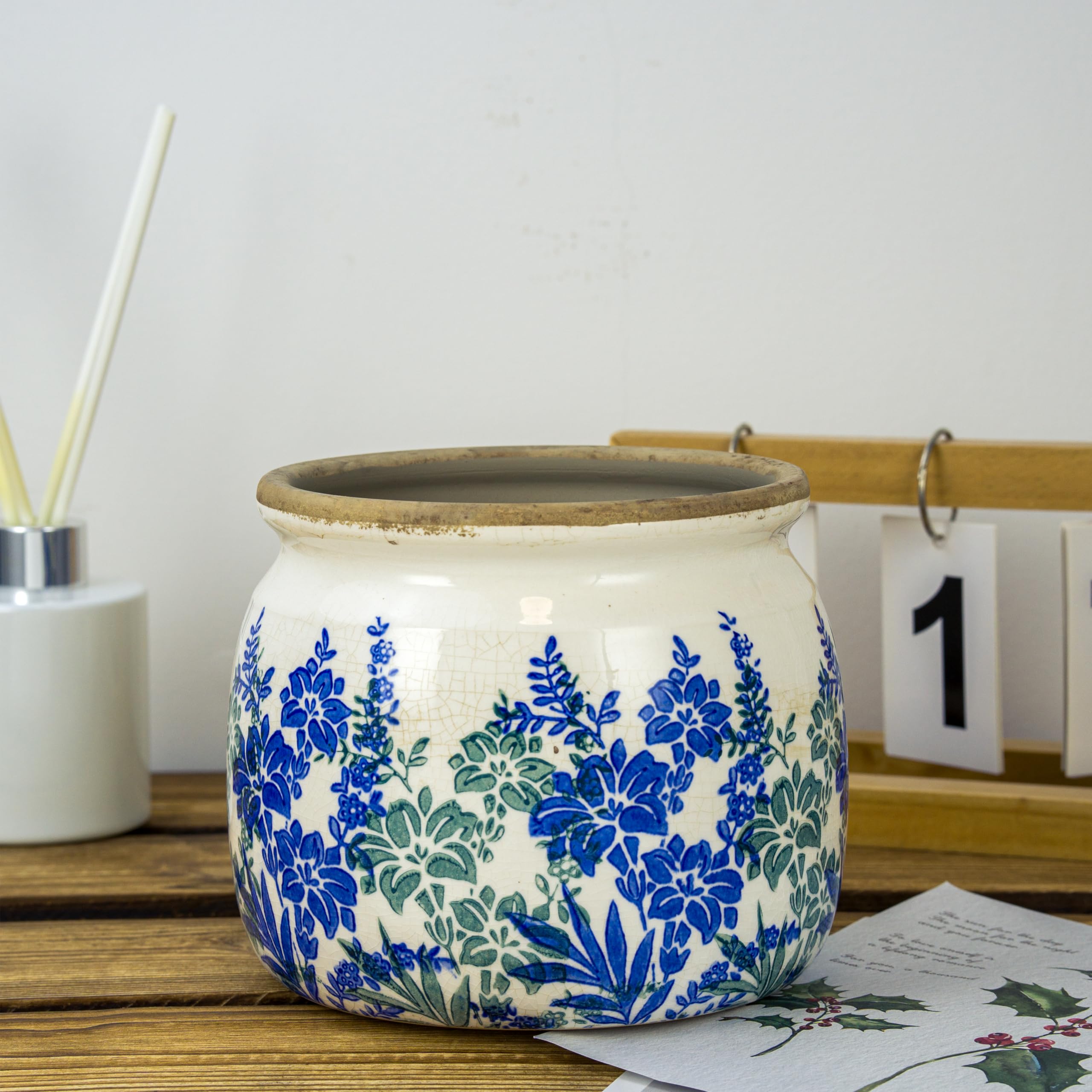 Dosayes window-sill centerpiece pot brightening a cozy corner.