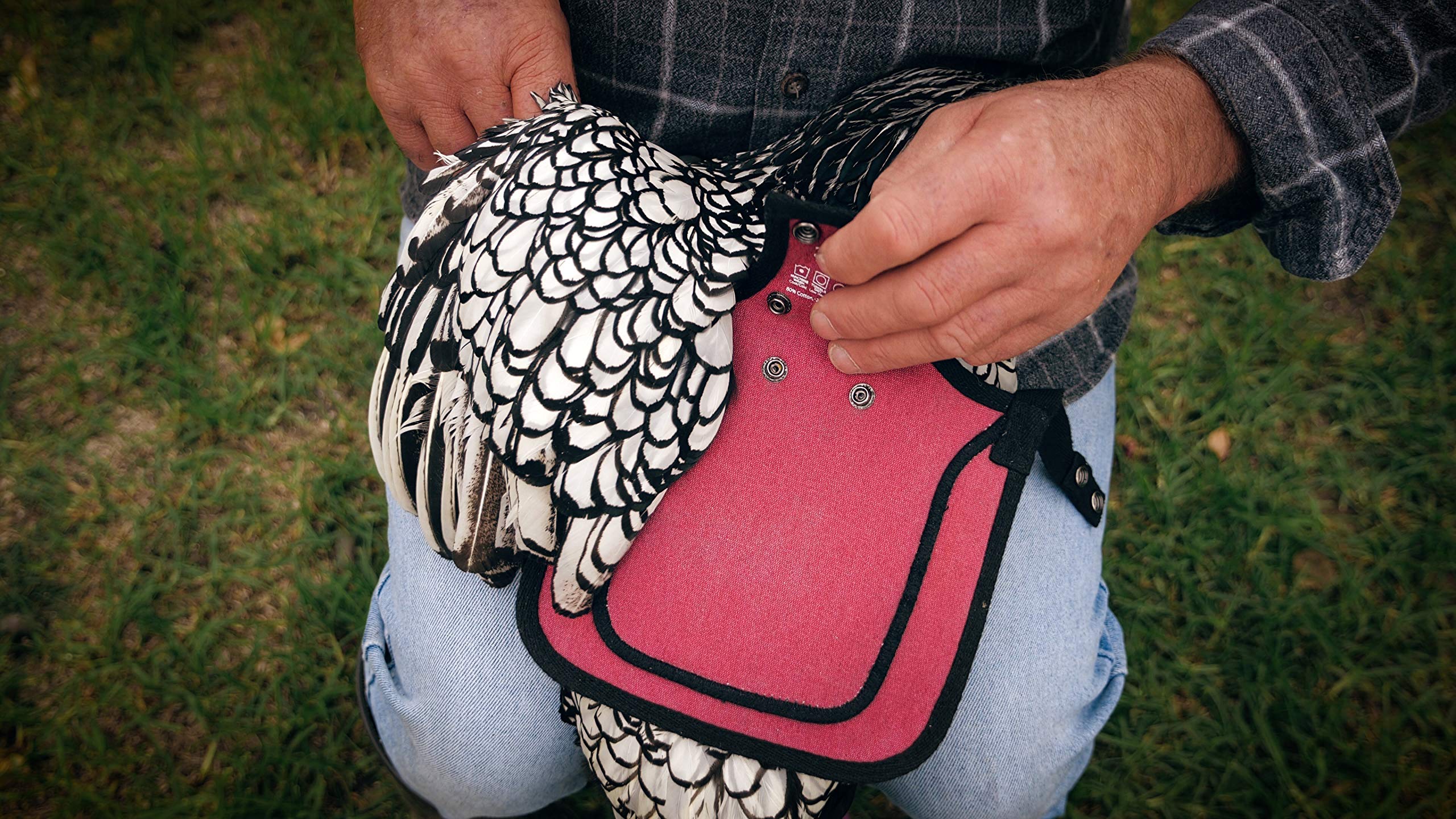 DOWN UNDER OUTDOORS includes shoulder cover for extra feather protection during wear