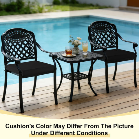 Downluxe black outdoor chair cushions match modern patio decor.