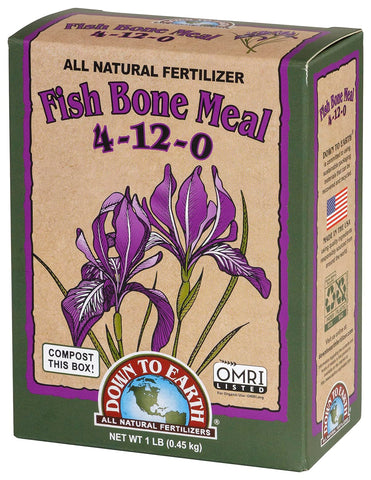 Down To Earth fish bone meal blooming flowers in garden bed benefiting phosphorus