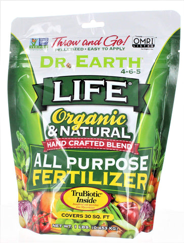 Dr. Earth 91164 Minis Life all-purpose fertilizer bottle boosts organic vegetable growth.