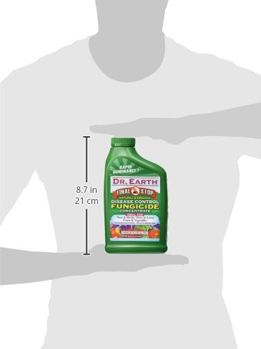 Dr. Earth Concentrate Fungicide applied in garden for durable fungal protection.