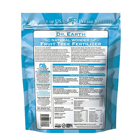 Dr. Earth Natural Wonder fertilizer shown ready to apply for seasonal fruit tree feeding.