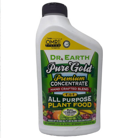 Dr. Earth Pure Gold liquid plant food bottle ready for garden feeding